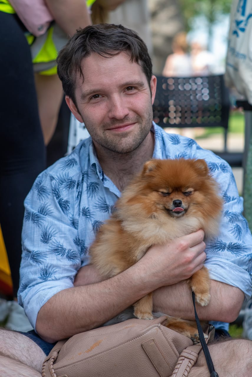 a person holding a dog